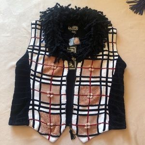 Burberry inspired fringe collar sweater vest.